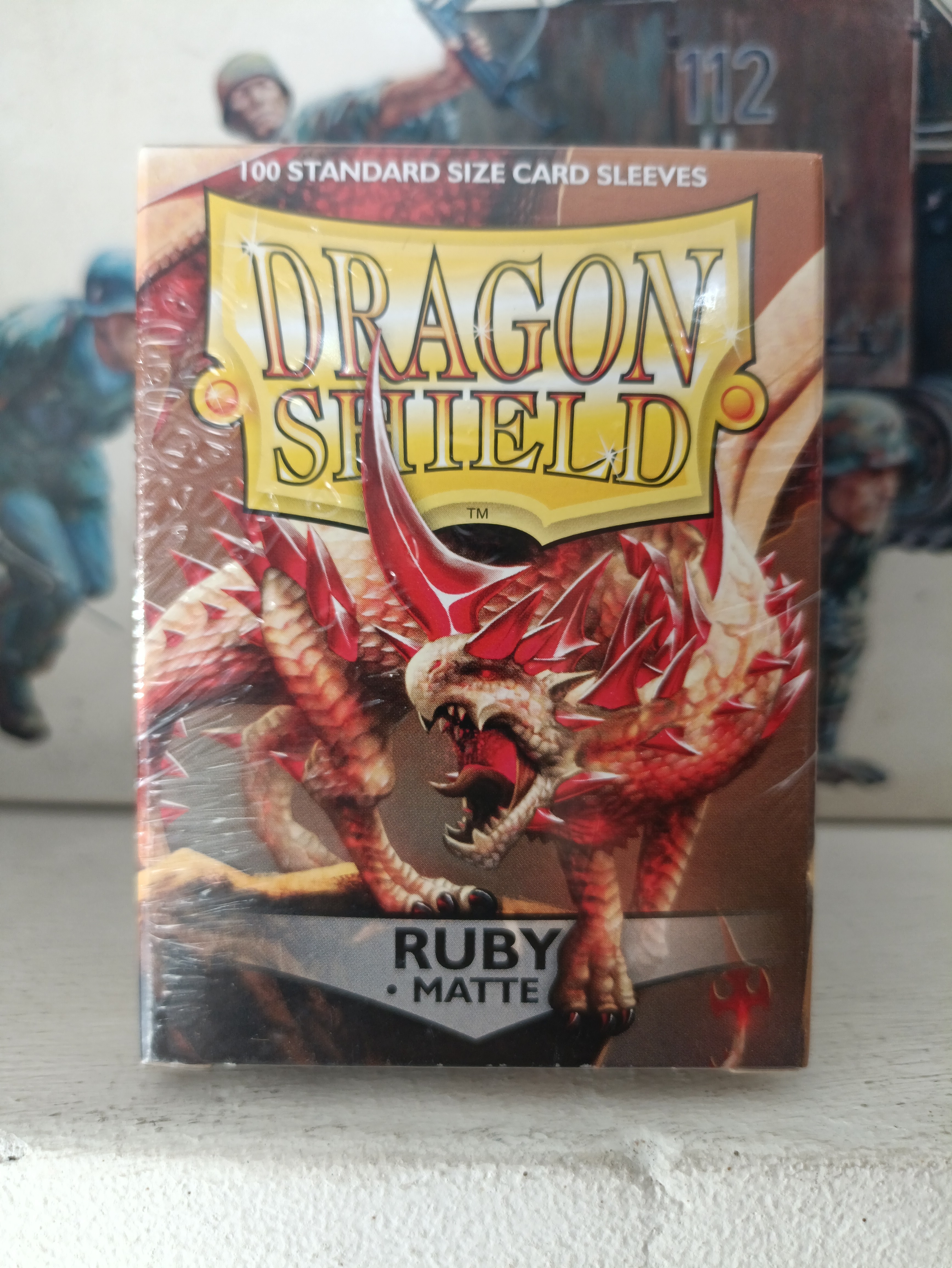 Dragon Shield Sleeves: 
Standard- Matte Ruby 100 ct.)