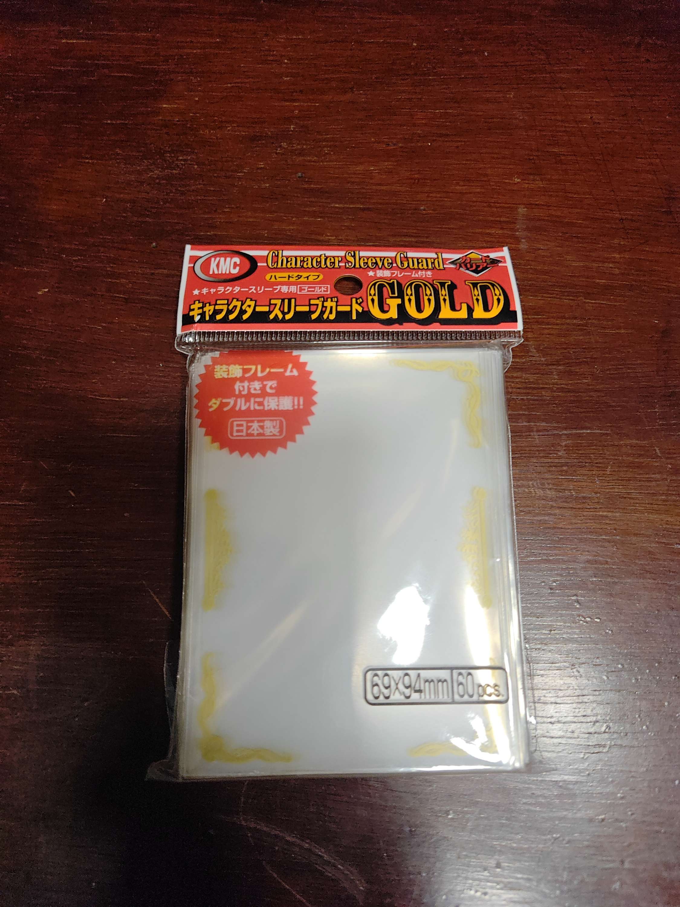 Sleeves: Over Sized Guard Clear Gold Scroll (60)